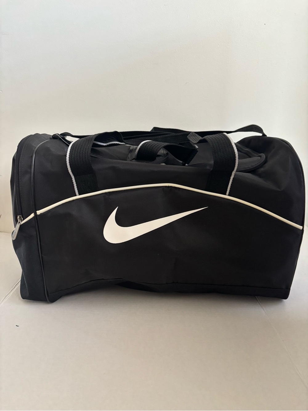 Nike Black Duffel Bag with White Swoosh